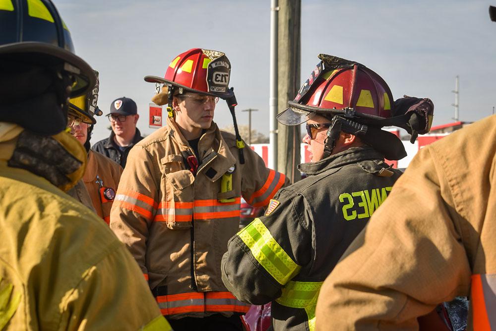 fire fighters talking to each other